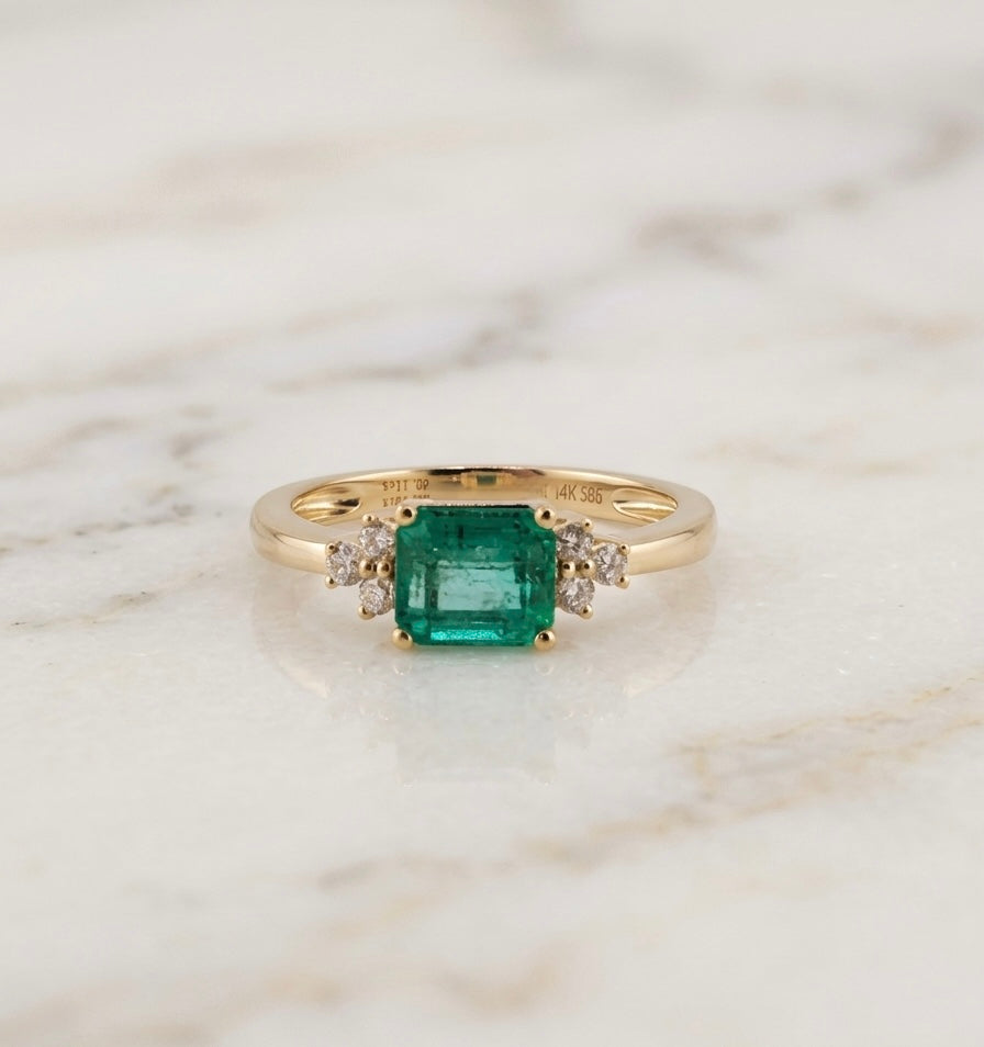 14K yellow gold ring set with a 0.776 ct emerald and diamonds