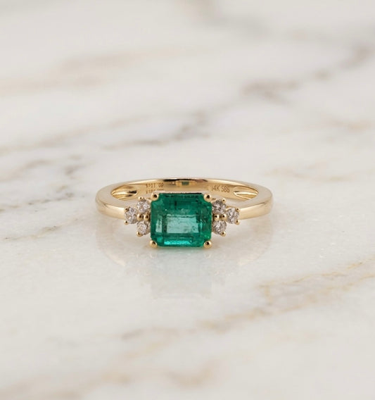 14K yellow gold ring set with a 0.776 ct emerald and diamonds